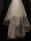 1 Tier bridal wedding veil in 1.7 meter length, sewn with golden thread trim - Ivory